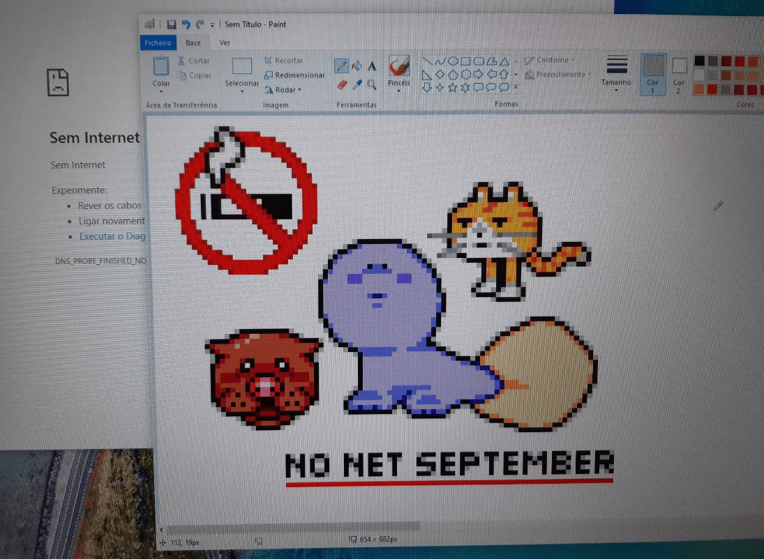 A desktop computer screen featuring an error message on Chrome and a couple of pixel art doodles made on MS Paint with «No Net September» written underneath them.